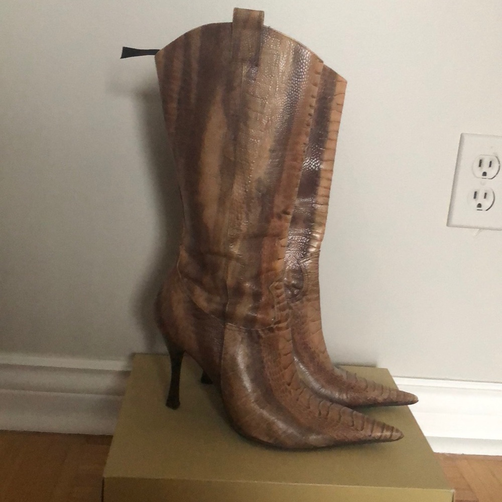 Point toe mid calf boots.